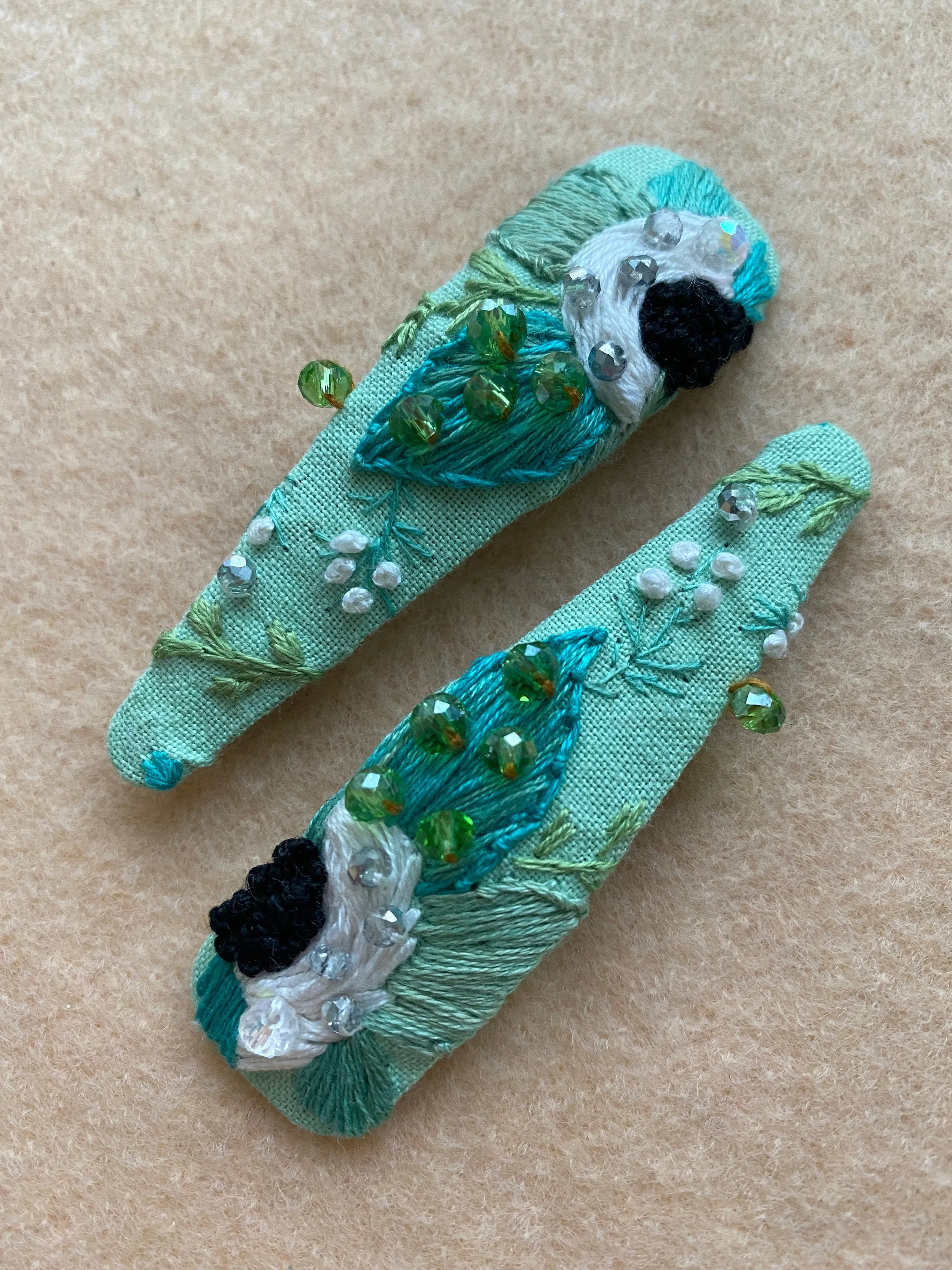 Mint embroidered hair clip set