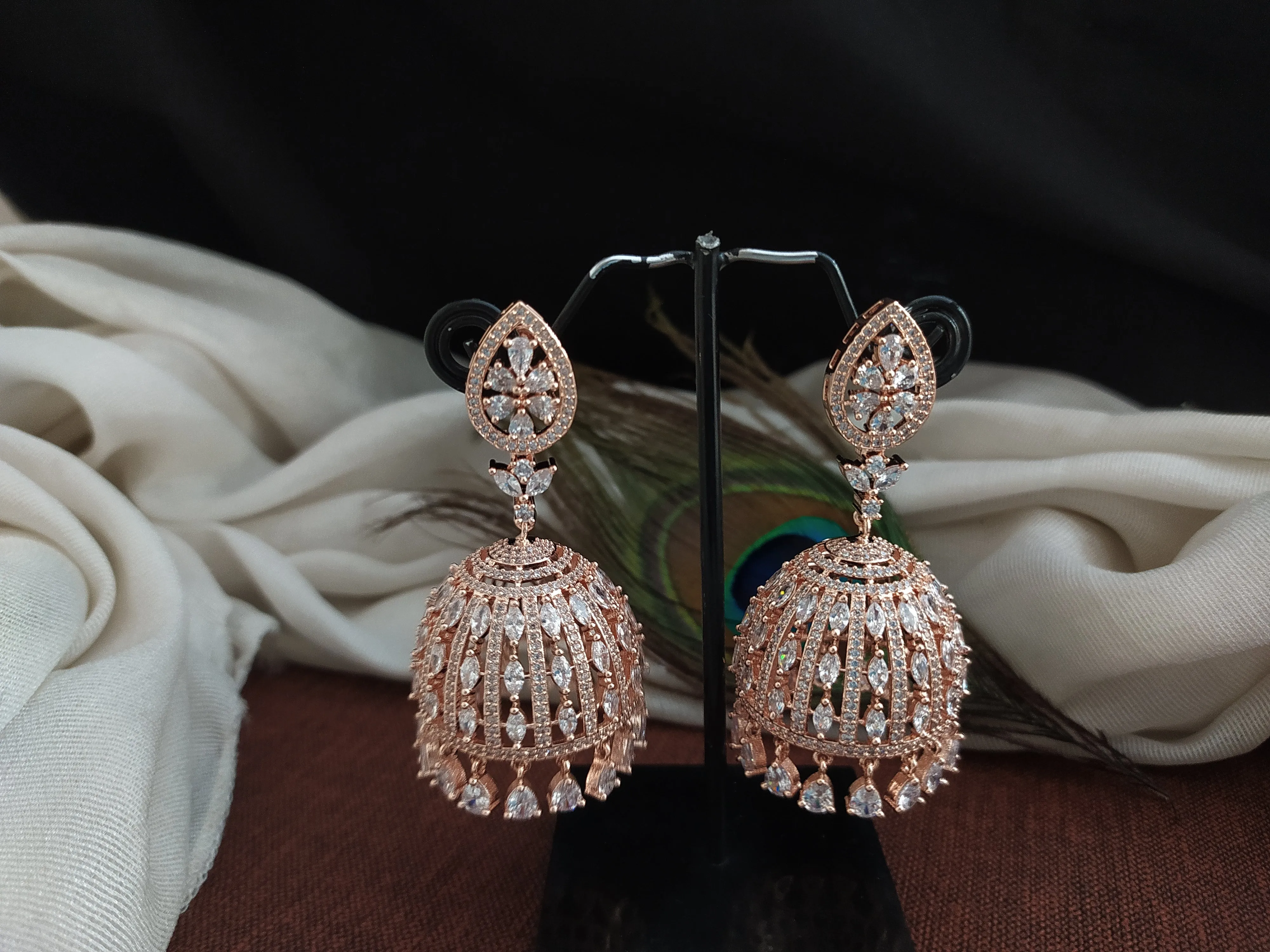 Radiant Zircon Stone Diamond Pear Studded Jhumki Earrings