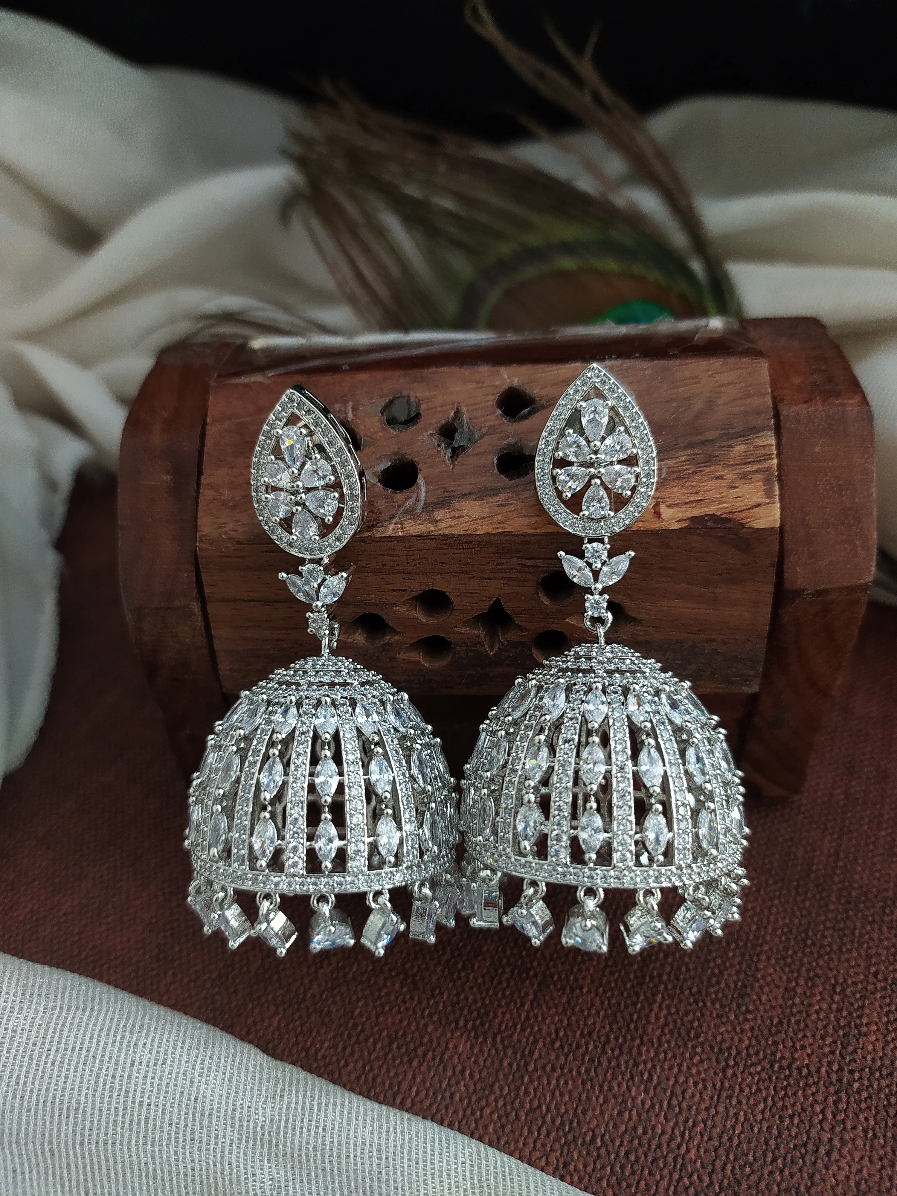 Radiant Zircon Stone Diamond Pear Studded Jhumki Earrings