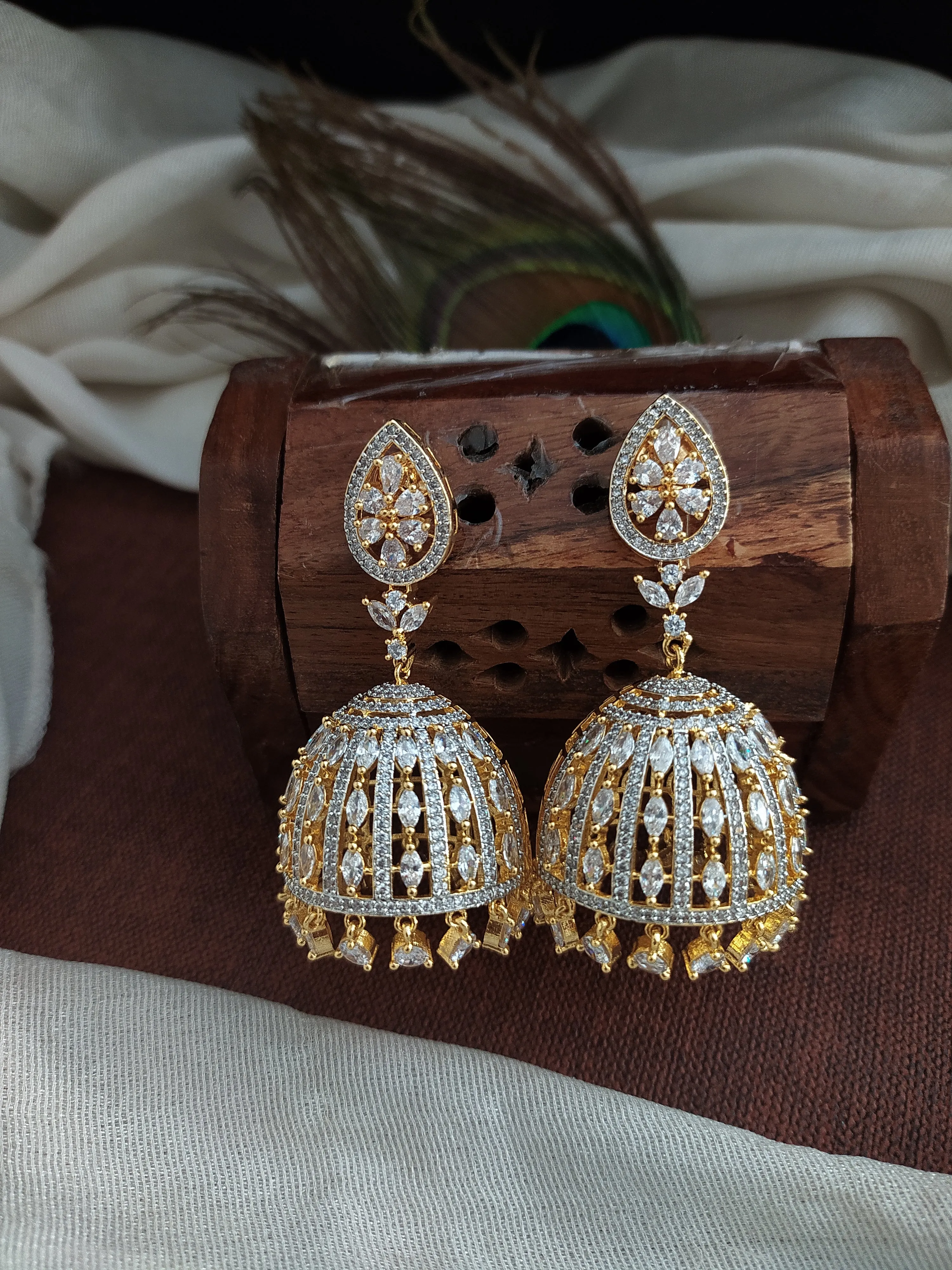 Radiant Zircon Stone Diamond Pear Studded Jhumki Earrings